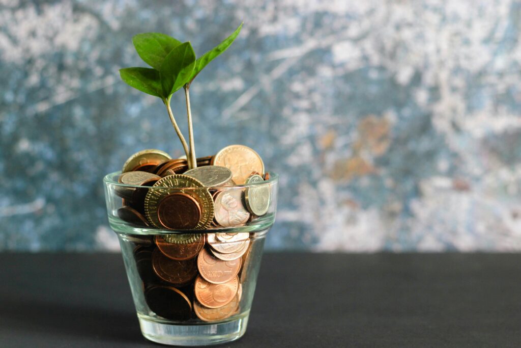 A pot full of saved money from shopping around for box truck insurance.