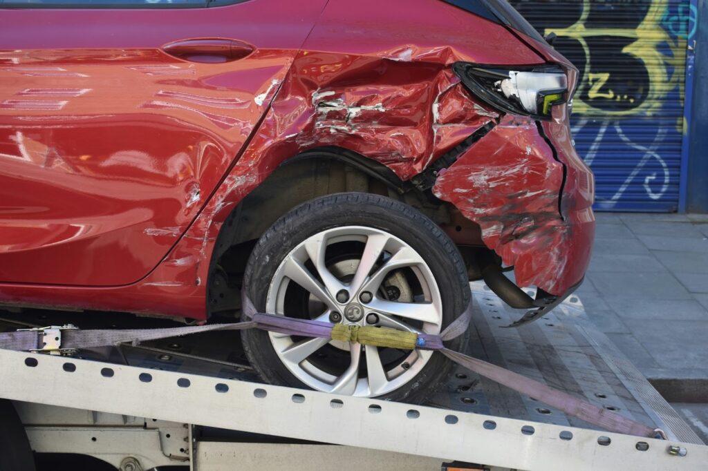 A car that has suffered damage in an accident, covered by auto insurance. 