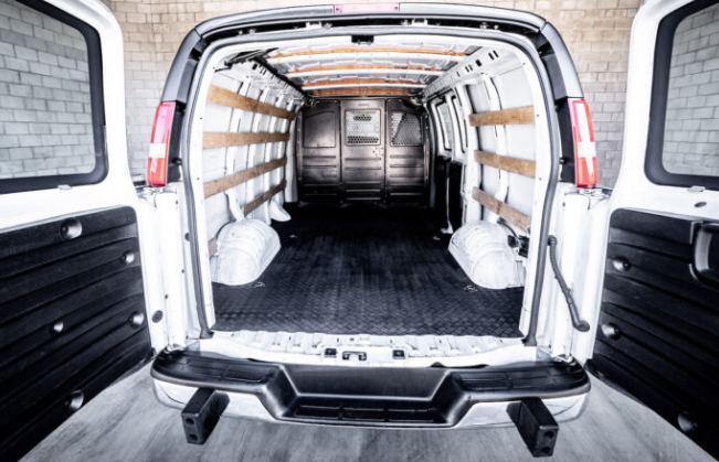 Interior view of an empty cargo van, ready to be filled and protected with tailored commercial van insurance.