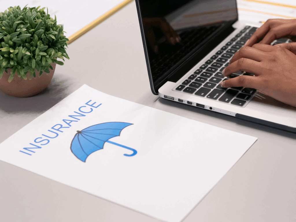 A person searching for business contents insurance online.