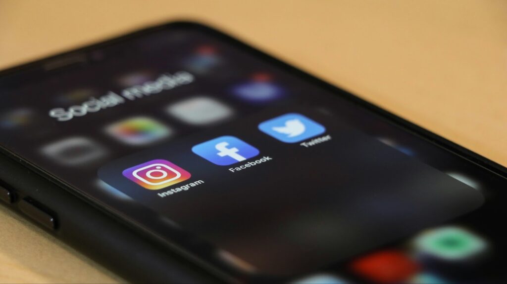 A phone with several social media platforms, often used as part of building insurance calculations.