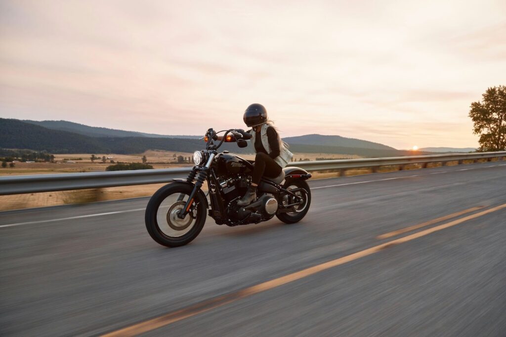 A driver enjoying the open road, protected by comprehensive motorcycle insurance.
